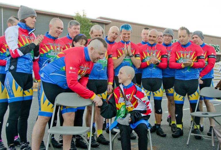 Tour De Rock heading down-Island after head shaves, spaghetti dinner