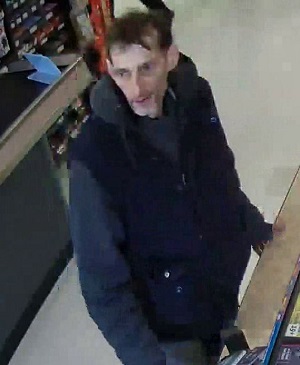Police seek purse snatcher