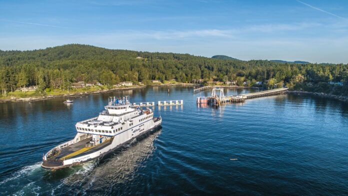 FILE - BC Government photo of a ferry on the water approaching a dock