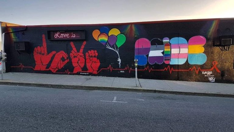 Nanaimo RCMP seek culprit behind vandalism of LGBT+ crosswalk, mural